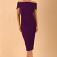 model is wearing diva catwalk amelia pencil dress with bardot neckline and ruched back in Passion Purple front