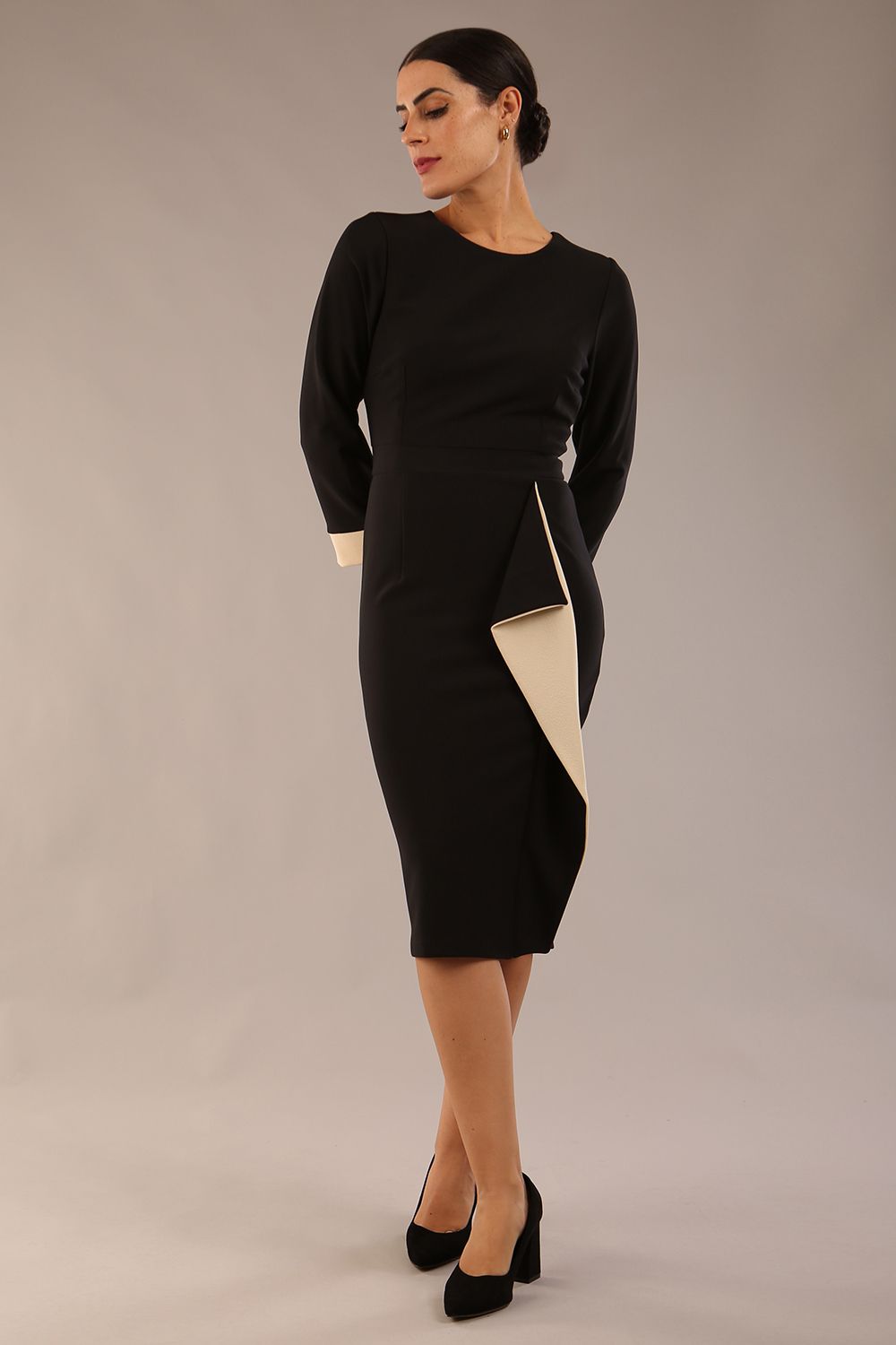 model is wearing diva catwalk bounty contrast pencil dress with rounded neckline and waistband in black and beige colours front