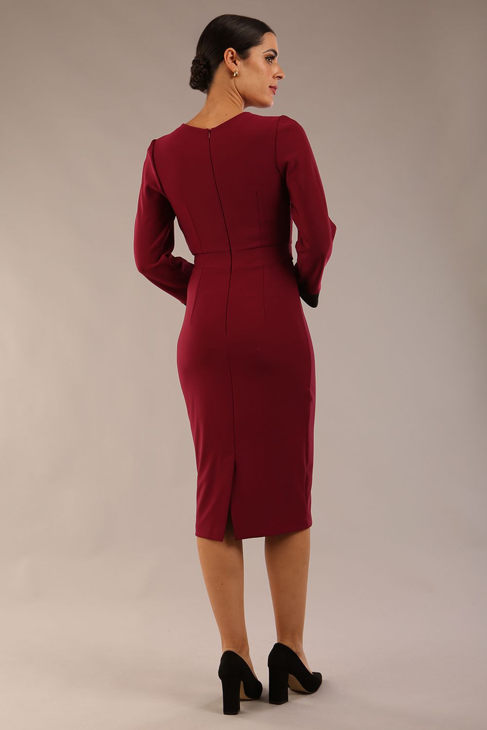 model is wearing diva catwalk bounty contrast pencil dress with rounded neckline and waistband in blissful burgundy and black colours back