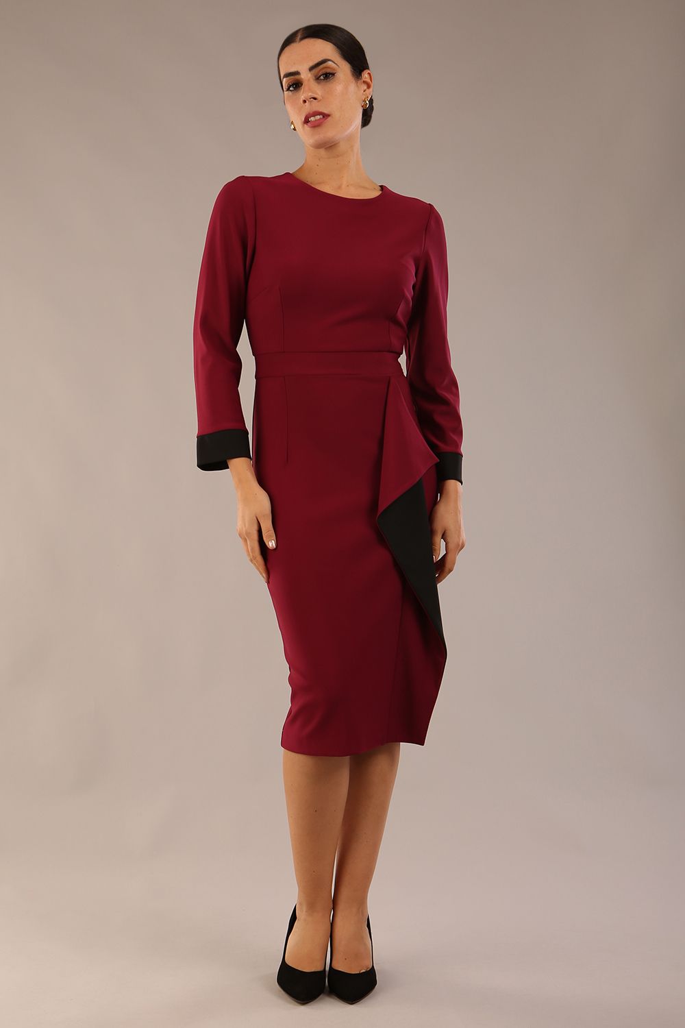 model is wearing diva catwalk bounty contrast pencil dress with rounded neckline and waistband in blissful burgundy and black colours front