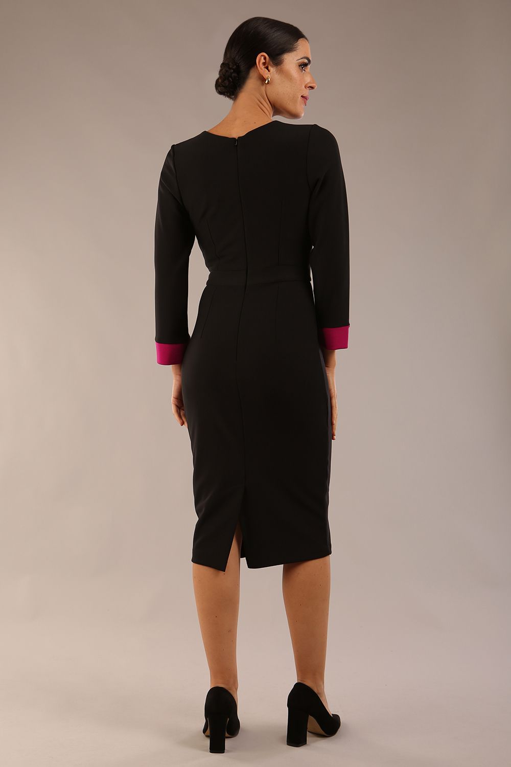 model is wearing diva catwalk bounty contrast pencil dress with rounded neckline and waistband in black and magenta haze colours back