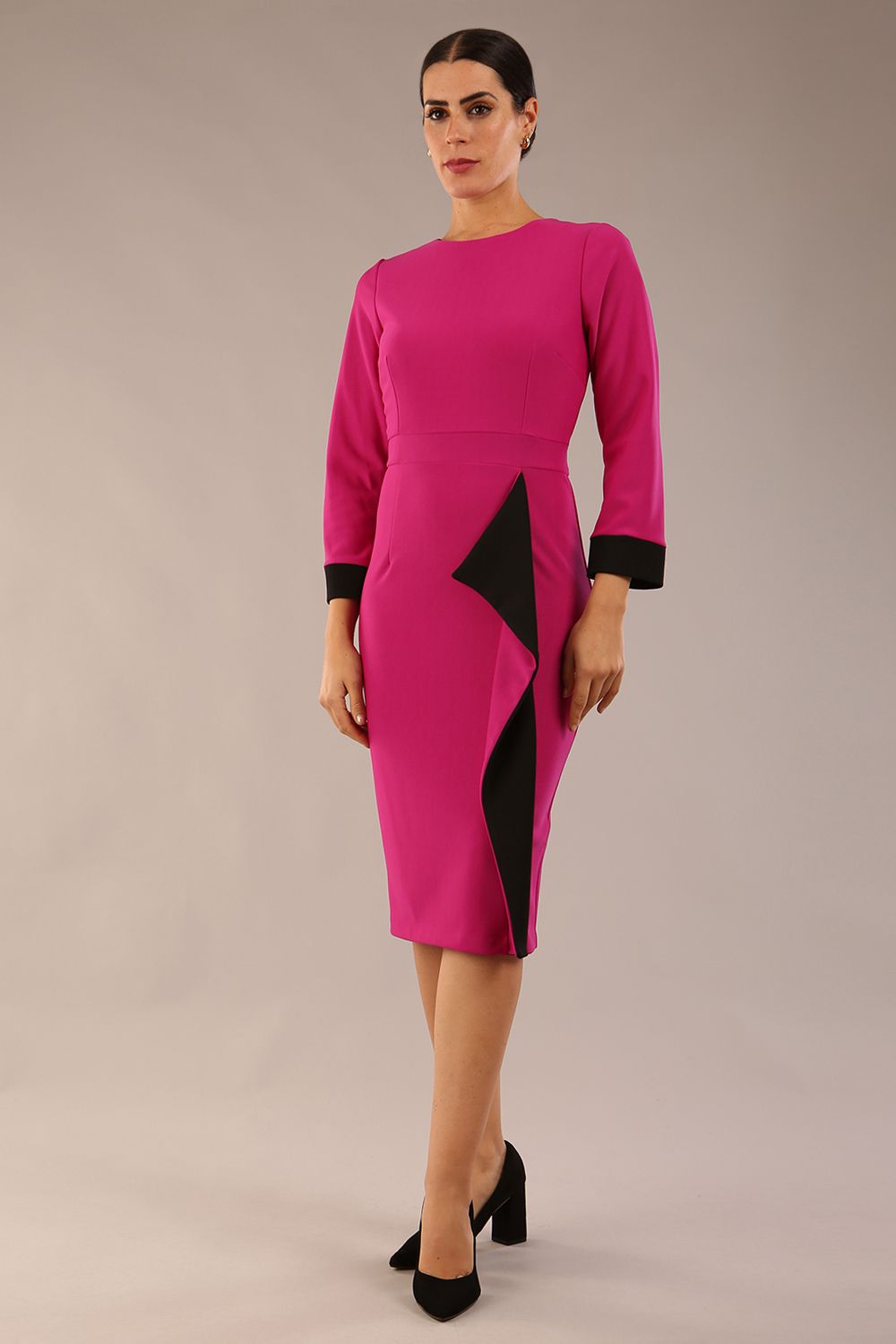 model is wearing diva catwalk bounty contrast pencil dress with rounded neckline and waistband in magenta haze and black colours front