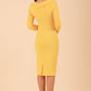 Model wearing diva catwalk Monique 3/4 Sleeve Pencil Dress with Overlapping Folded Round Neckline and 3/4 sleeves and knee length in Sunshine Yellow back