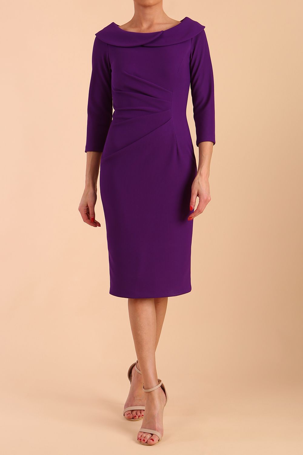Model wearing diva catwalk Monique 3/4 Sleeve Pencil Dress with Overlapping Folded  Round Neckline and 3/4 sleeves and knee length in Passion Purple side