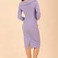Model wearing diva catwalk Monique 3/4 Sleeve Pencil Dress with Overlapping Folded Round Neckline and 3/4 sleeves and knee length in Vista Blue back