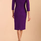 Model wearing diva catwalk Monique 3/4 Sleeve Pencil Dress with Overlapping Folded  Round Neckline and 3/4 sleeves and knee length in Passion Purple back