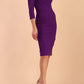 Model wearing diva catwalk Monique 3/4 Sleeve Pencil Dress with Overlapping Folded  Round Neckline and 3/4 sleeves and knee length in Passion Purple side