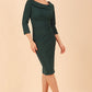 Model wearing diva catwalk Monique 3/4 Sleeve Pencil Dress with Overlapping Folded Round Neckline and 3/4 sleeves and knee length in Green Gables front