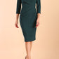 Model wearing diva catwalk Monique 3/4 Sleeve Pencil Dress with Overlapping Folded  Round Neckline and 3/4 sleeves and knee length in Green Gables front