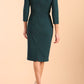 Model wearing diva catwalk Monique 3/4 Sleeve Pencil Dress with Overlapping Folded  Round Neckline and 3/4 sleeves and knee length in Green gables back