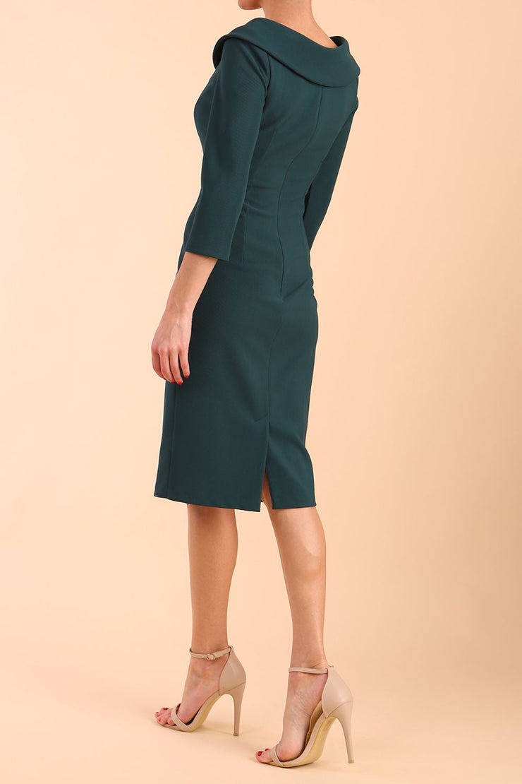 Model wearing diva catwalk Monique 3/4 Sleeve Pencil Dress in Green Gables side back
