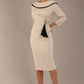 Model wearing diva catwalk Seed Elsye 3/4 Sleeve Knee Length Pencil Dress with Fold over bateau collar neckline with contrast piping and Bow feature on the left side of the bodice in Sandy Cream colour front side (Sandy Cream / Black Contrast)