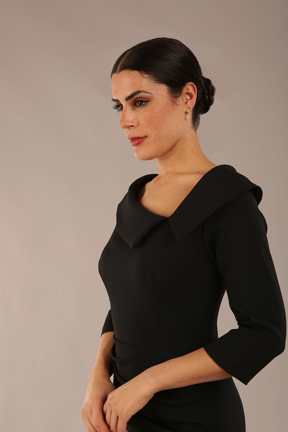Model is wearing a diva catwalk Bentley 3/4 Sleeve Knee Length Pencil Dress in Black colour