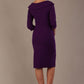 Model wearing diva catwalk Bentley 3/4 Sleeve Knee Length Pencil Dress in Deep Purple back view