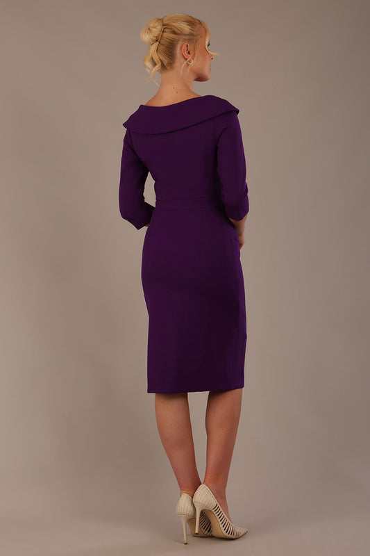 Model wearing diva catwalk Bentley 3/4 Sleeve Knee Length Pencil Dress in Deep Purple back view