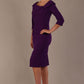 Model wearing diva catwalk Bentley 3/4 Sleeve Knee Length Pencil Dress in Deep Purple front