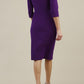 Model wearing diva catwalk Bentley 3/4 Sleeve Knee Length Pencil Dress in Deep Purple back