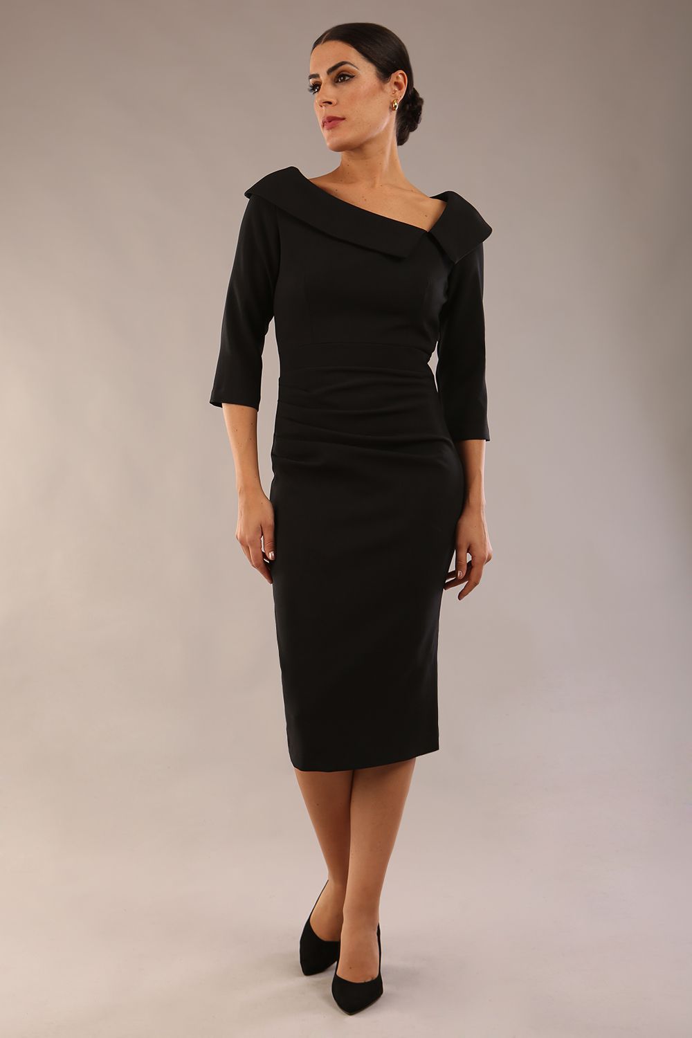 Model is wearing a diva catwalk Bentley 3/4 Sleeve Knee Length Pencil Dress in Black colour