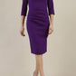 Model wearing diva catwalk Bentley 3/4 Sleeve Knee Length Pencil Dress in Deep Purple front