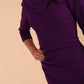 Model wearing diva catwalk Bentley 3/4 Sleeve Knee Length Pencil Dress in Deep Purple side detail