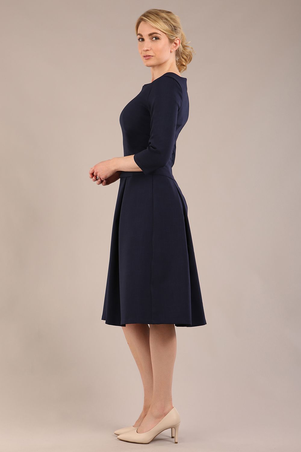 model is wearing a diva catwalk Cordelia Square Neck Pleated Midi A-line Dress with 3/4 sleeve in navy blue colour side