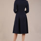 model is wearing a diva catwalk Cordelia Square Neck Pleated Midi A-line Dress with 3/4 sleeve in navy blue colour back