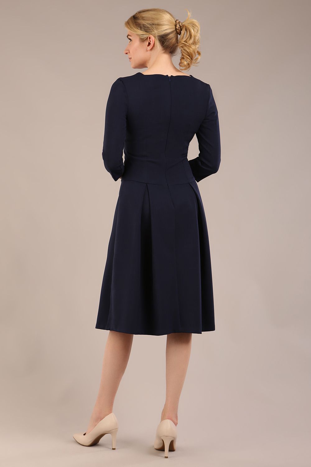 model is wearing a diva catwalk Cordelia Square Neck Pleated Midi A-line Dress with 3/4 sleeve in navy blue colour back