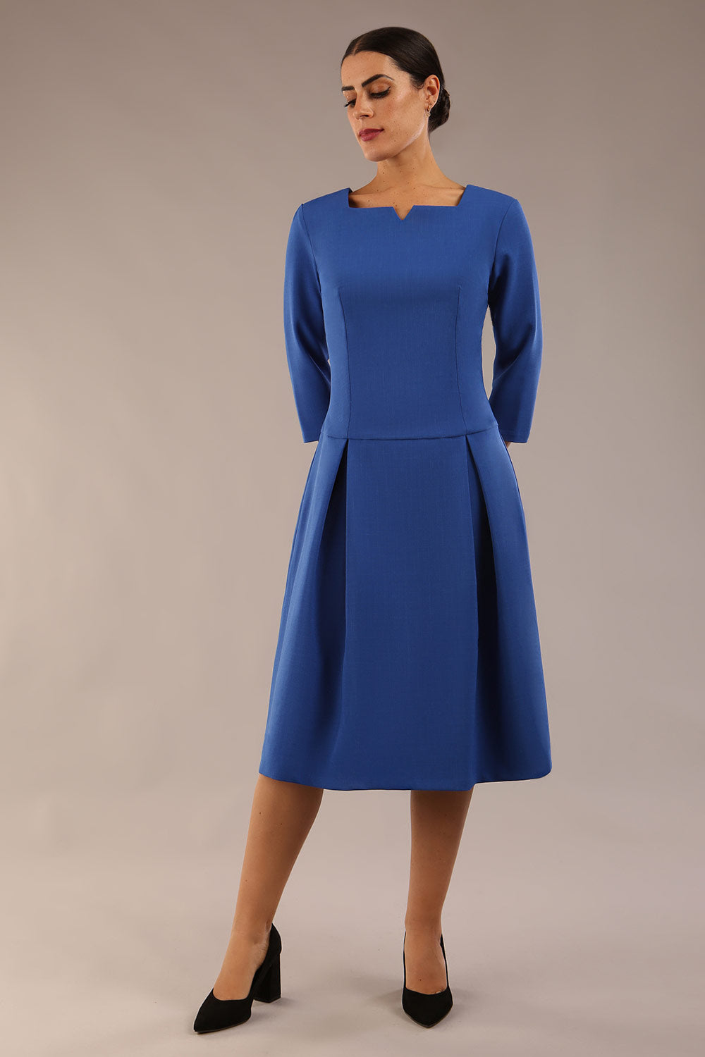 model is wearing a diva catwalk Cordelia Square Neck Pleated Midi A-line Dress with 3/4 sleeve in cobalt blue colour front