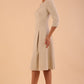 Model wearing diva catwalk Cordelia full skirt dress in cream colour