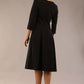 model is wearing a diva catwalk Cordelia Square Neck Pleated Midi A-line Dress with 3/4 sleeve in black colour back