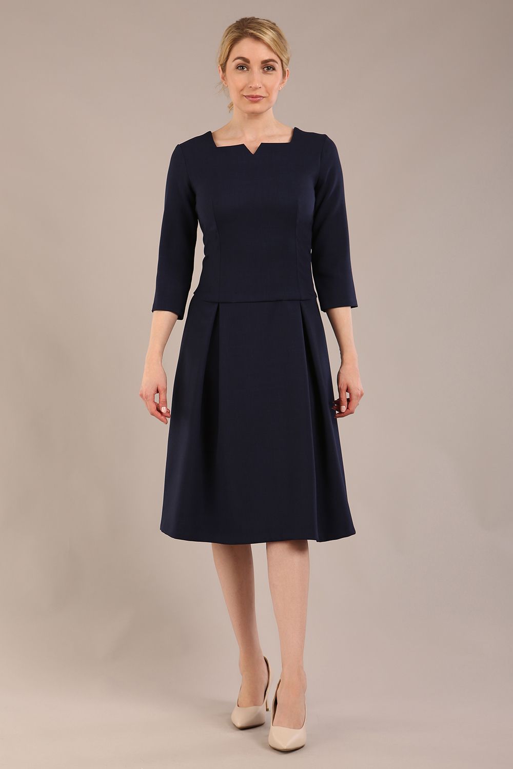 model is wearing a diva catwalk Cordelia Square Neck Pleated Midi A-line Dress with 3/4 sleeve in navy blue colour 