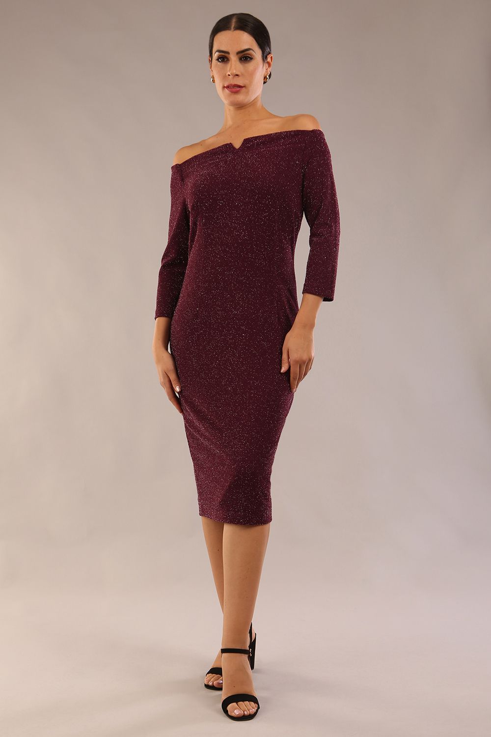 model is wearing a diva catwalk neptune pencil off-shoulder dress with 3/4 sleeve in burgundy sparkle front