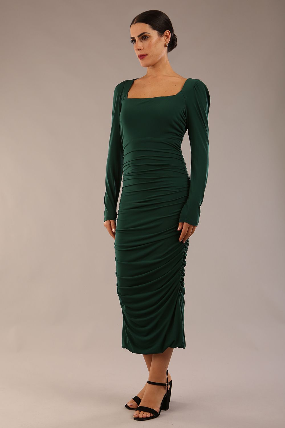 Model wearing diva catwalk Kiki Silky Stretch Ruched Midaxi Dress in Forest Green front