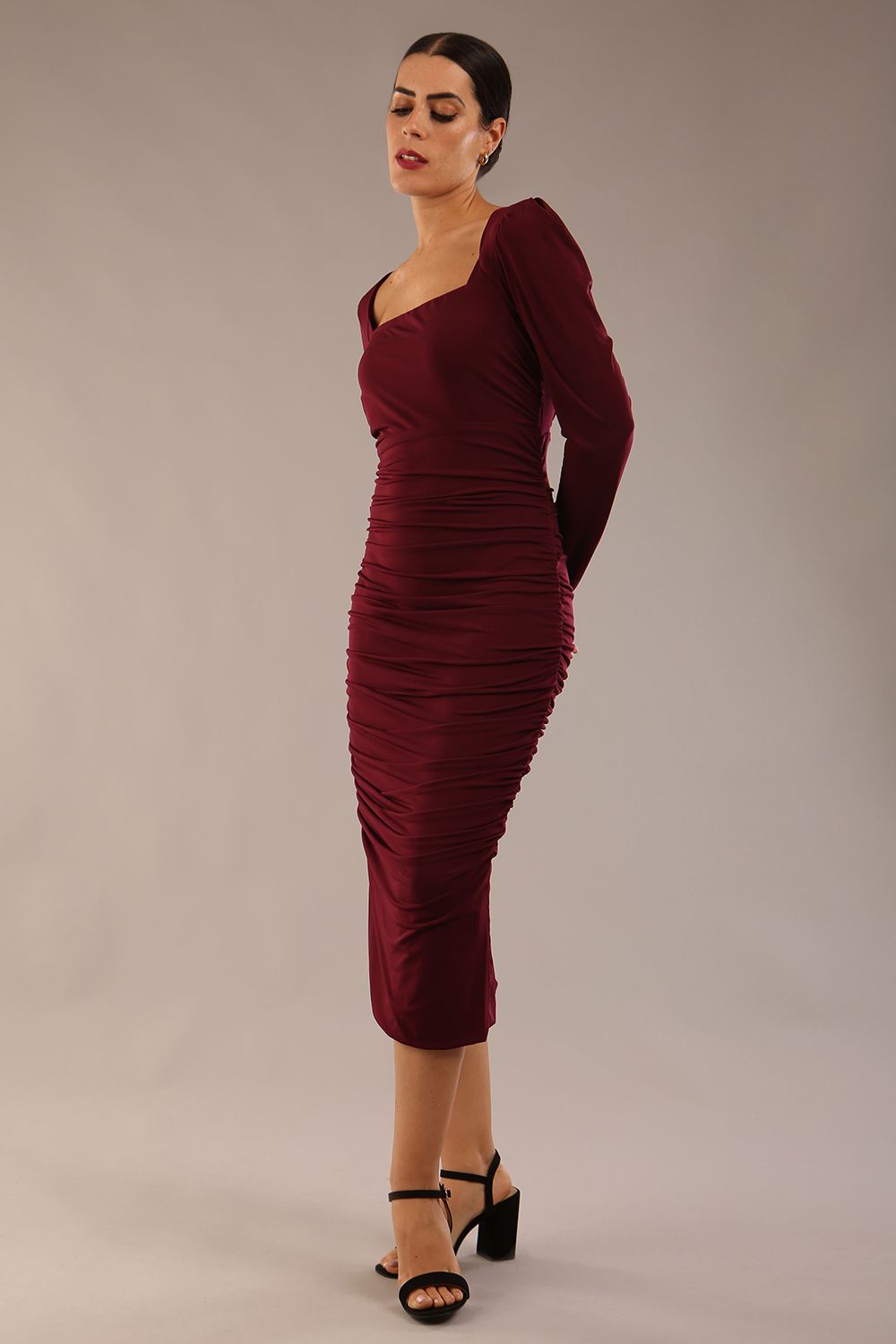 Model wearing diva catwalk Kiki Silky Stretch Ruched Midaxi Dress in Burgundy front