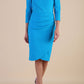 Model wearing diva catwalk Trixie dress in Turquoise Blue front