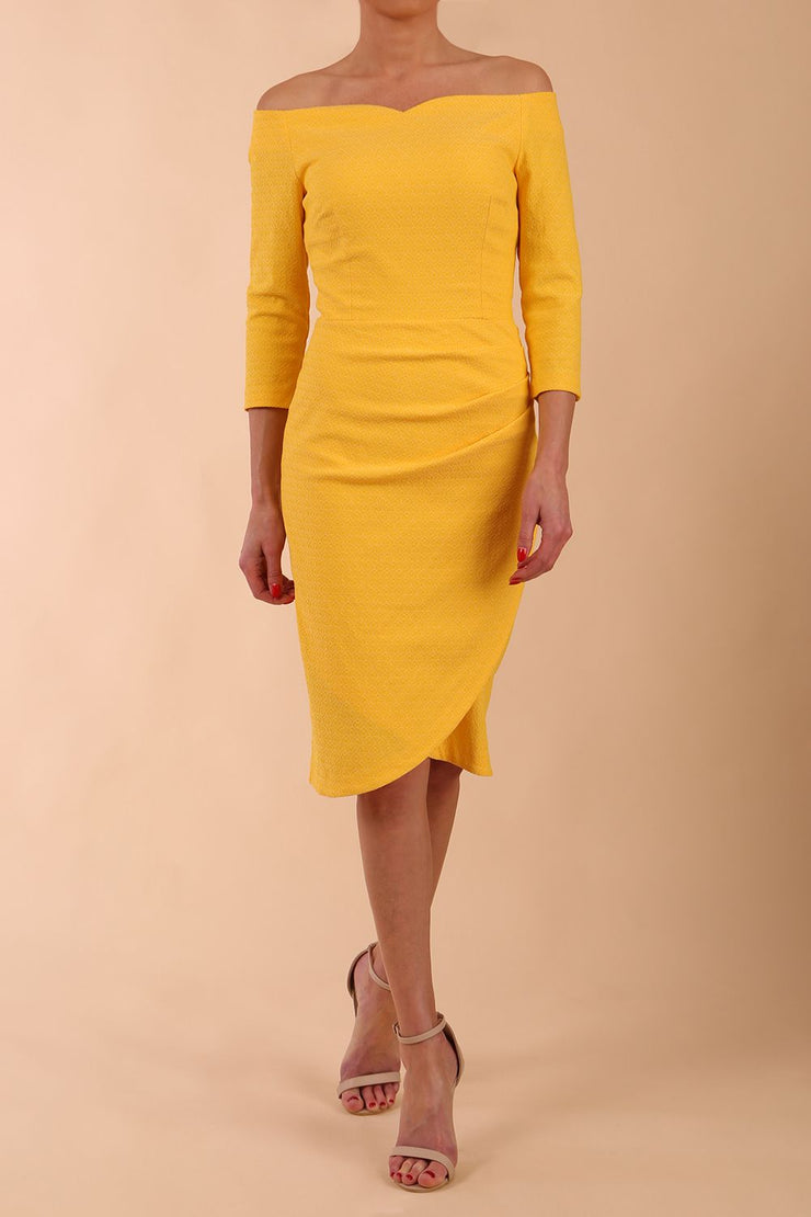 Model wearing diva catwalk Trixie dress in Sunrise Yellow front