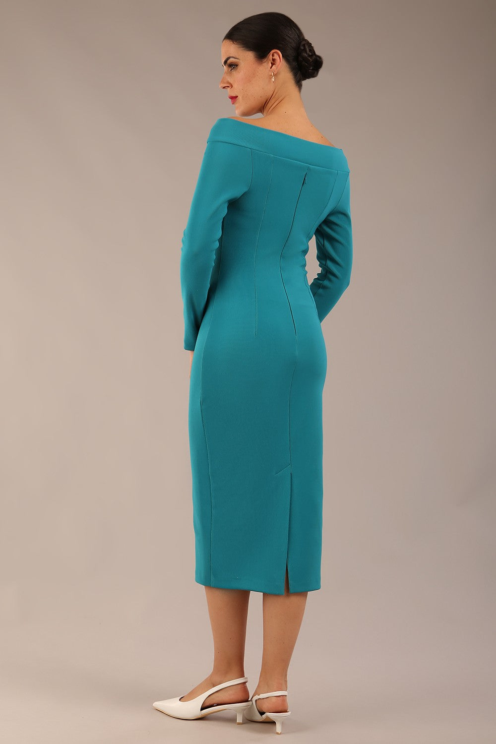brunette Model is wearing a DIVA Catwalk Faye Off Shoulder Long Sleeve Midi Pencil Dress in Mosaic Blue colour back image