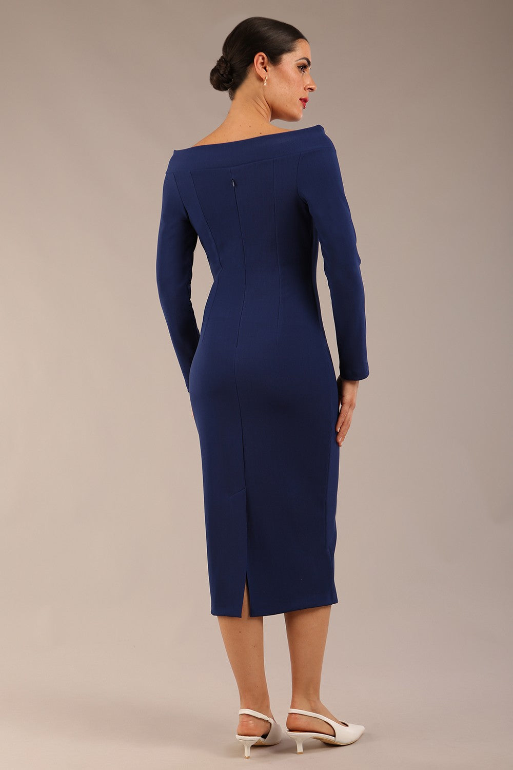 brunette Model is wearing a DIVA Catwalk Faye Off Shoulder Long Sleeve Midi Pencil Dress in Navy Blue colour back image