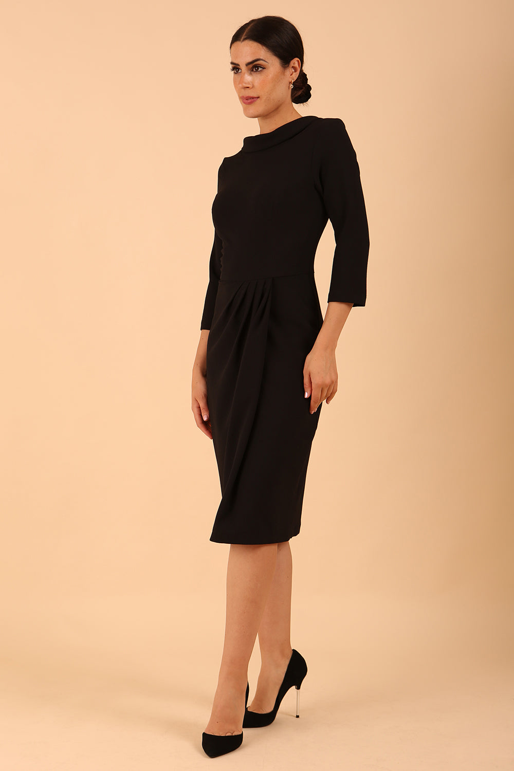 Model wearing diva catwalk Hazel pencil skirt dress with 3/4 sleeved in Black