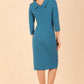 Model wearing diva catwalk Hazel pencil skirt dress with 3/4 sleeved in Tropical Teal back