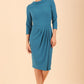 Model wearing diva catwalk Hazel pencil skirt dress with 3/4 sleeved in Tropical Teal front