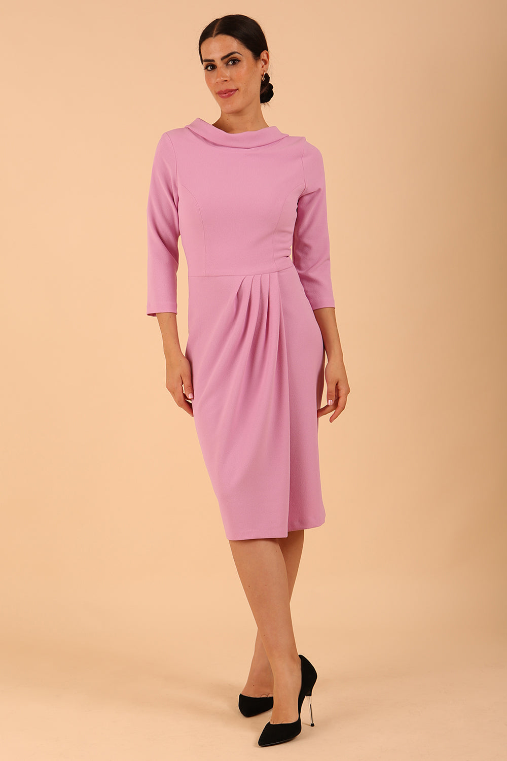 Model wearing diva catwalk Hazel pencil skirt dress with 3/4 sleeved in Dawn Pink