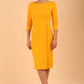 Model wearing diva catwalk Kinga 3/4 Sleeve pencil skirt dress yellow front