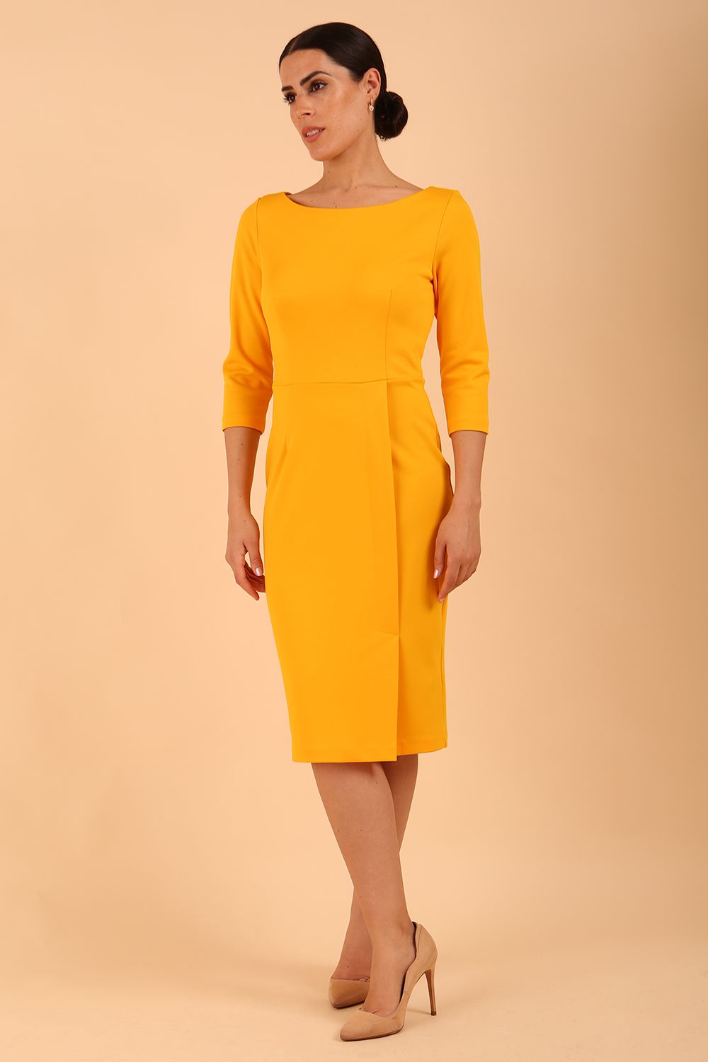Model wearing diva catwalk Kinga 3/4 Sleeve pencil skirt dress yellow front
