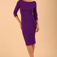 Model wearing diva catwalk Kinga 3/4 Sleeve pencil skirt dress in Passion purple colour
