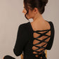 brunette model wearing a diva catwalk Zoey Sleeved Pencil Dress ribbon back with long sleeves and rushed details front and back in Black colour back close up