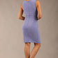 Brunette model is wearing a diva catwalk Lydia Sleeveless Mini Dress round neckline wrap style in vista blue colour back image 