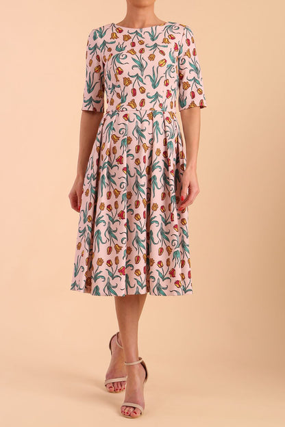 Model wearing diva catwalk Madison Swing Skirt Print Dress in Linear Tulip front