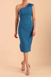 Brunette Model wearing diva catwalk Phoebe One Shoulder Pencil Dress in Tropical Teal
