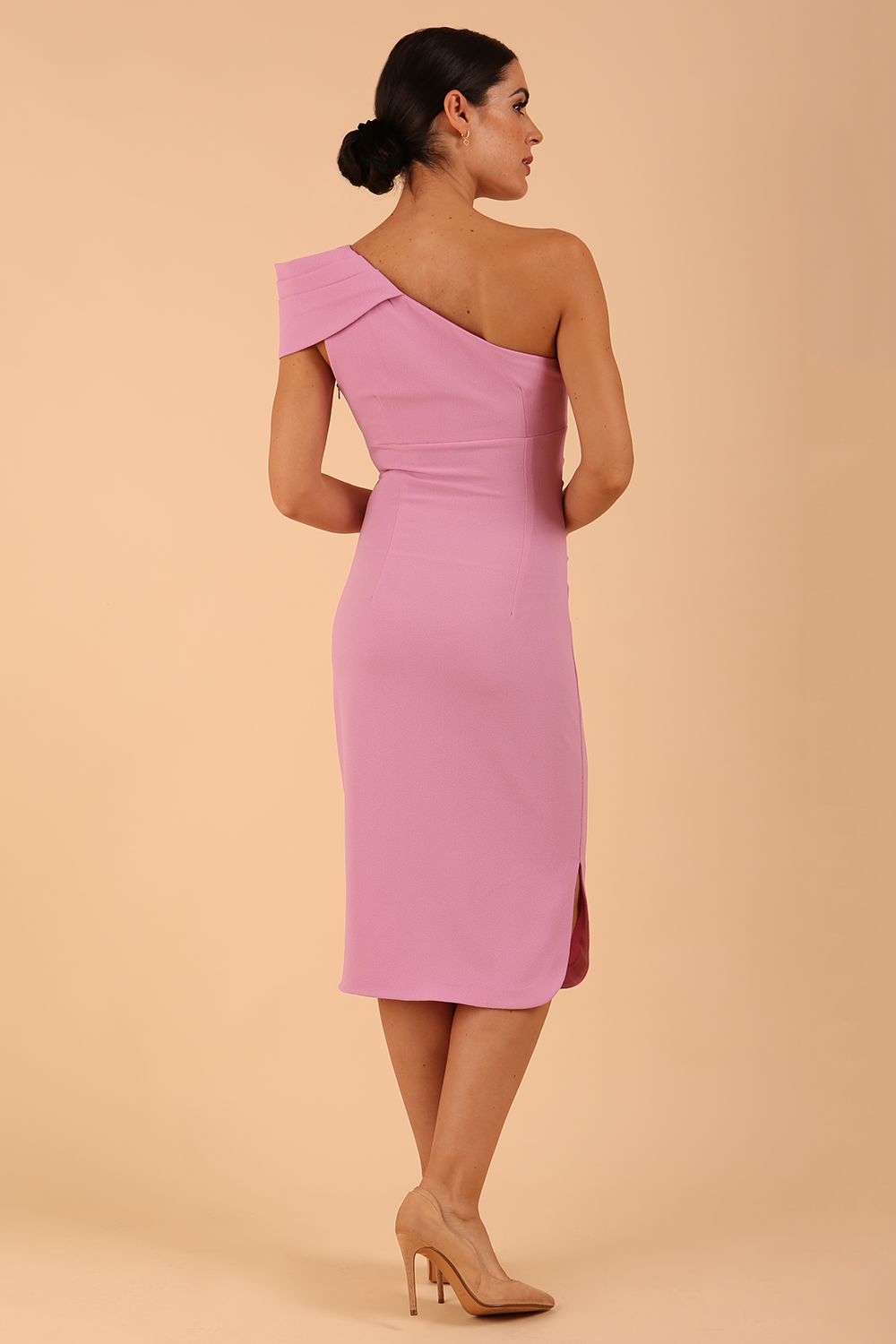 Brunette Model wearing diva catwalk Phoebe One Shoulder Pencil Dress in Dawn Pink back